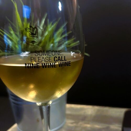 Wine glass with an original quote